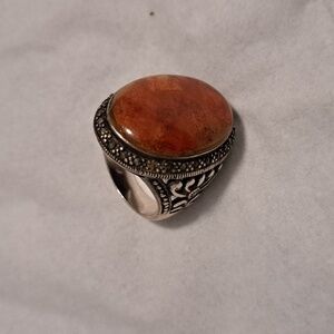 Sterling silver ring with a coral stone